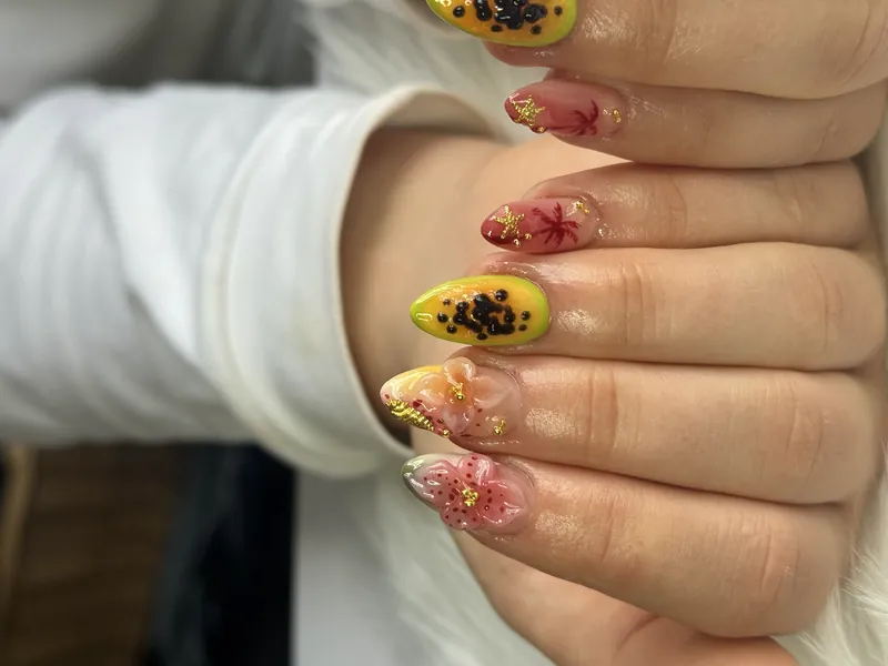Yassie Nailzz papaya nagels met sunset en 3D sculpted bloemen
